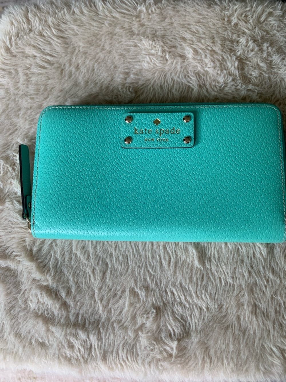 kate spade turquoise zip-around I wallet with gold logo